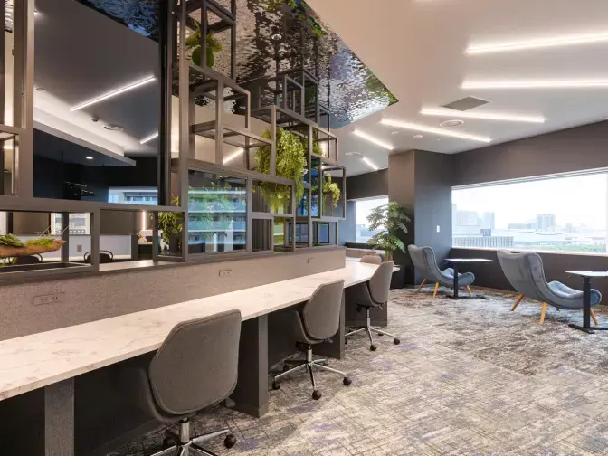 共有部_カフェブース。食事・通話・WEB会議OKの作業スペースです。※画像はイメージです。©bizcomfort